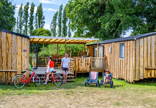 Mobil-home de madera con terraza, bicicletas en CAPFUN An Trest en SARZEAU (56).