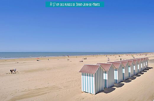 Playa y cabañas en el camping VAGUES OCEANES Bois Joly Saint-Jean-de-Monts.