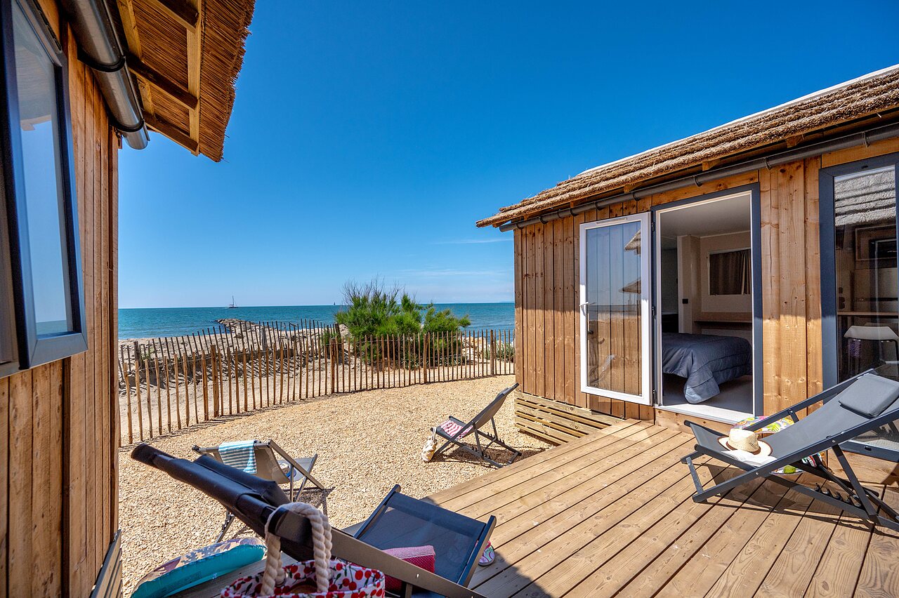 Chalet de madera, terraza, vistas al mar, camping CAPFUN Boucanet LE GRAU DU ROI (30).