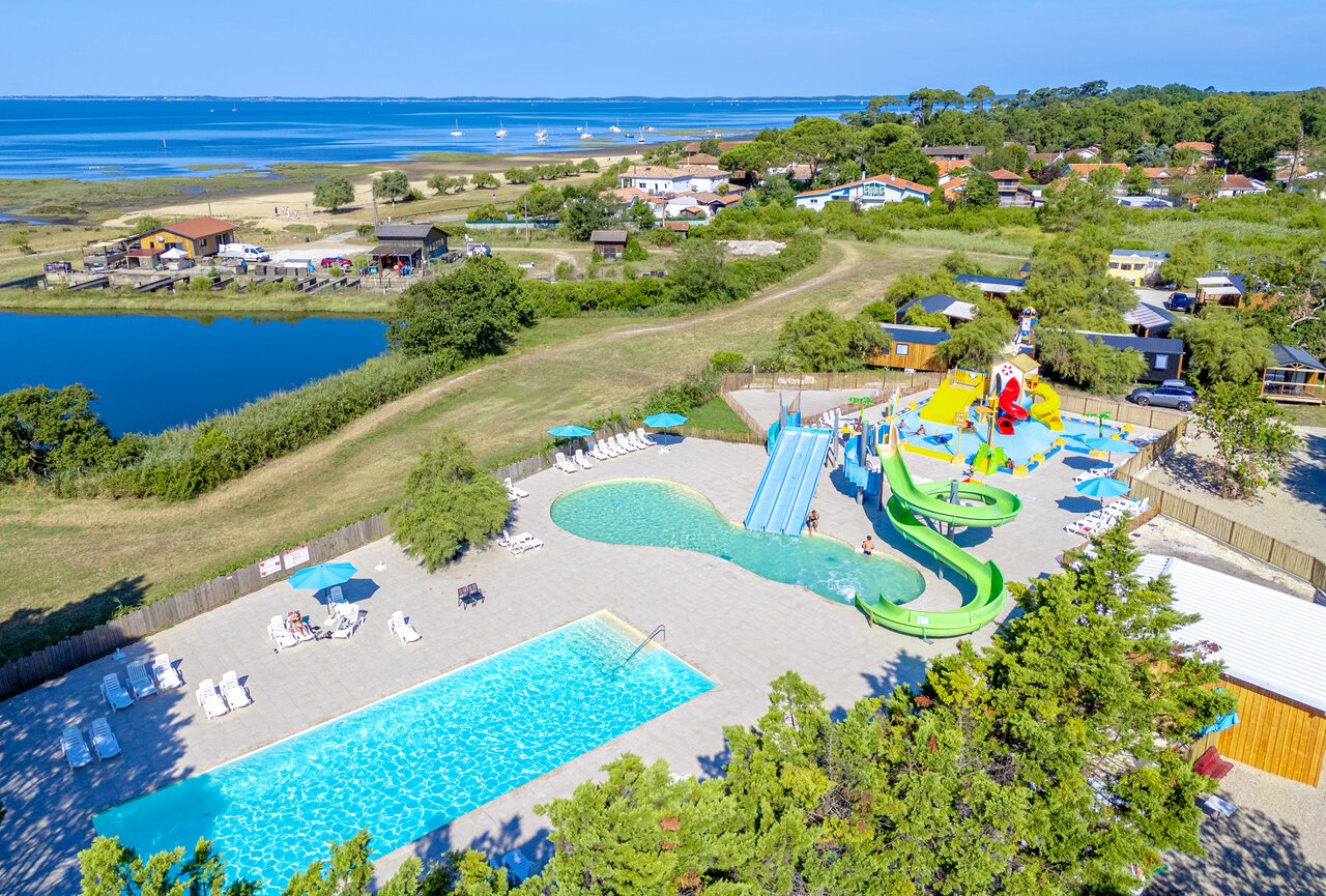 Piscinas, toboganes en el camping VAGUES OCEANES Coq Hardi en Cassy-Lanton (33).