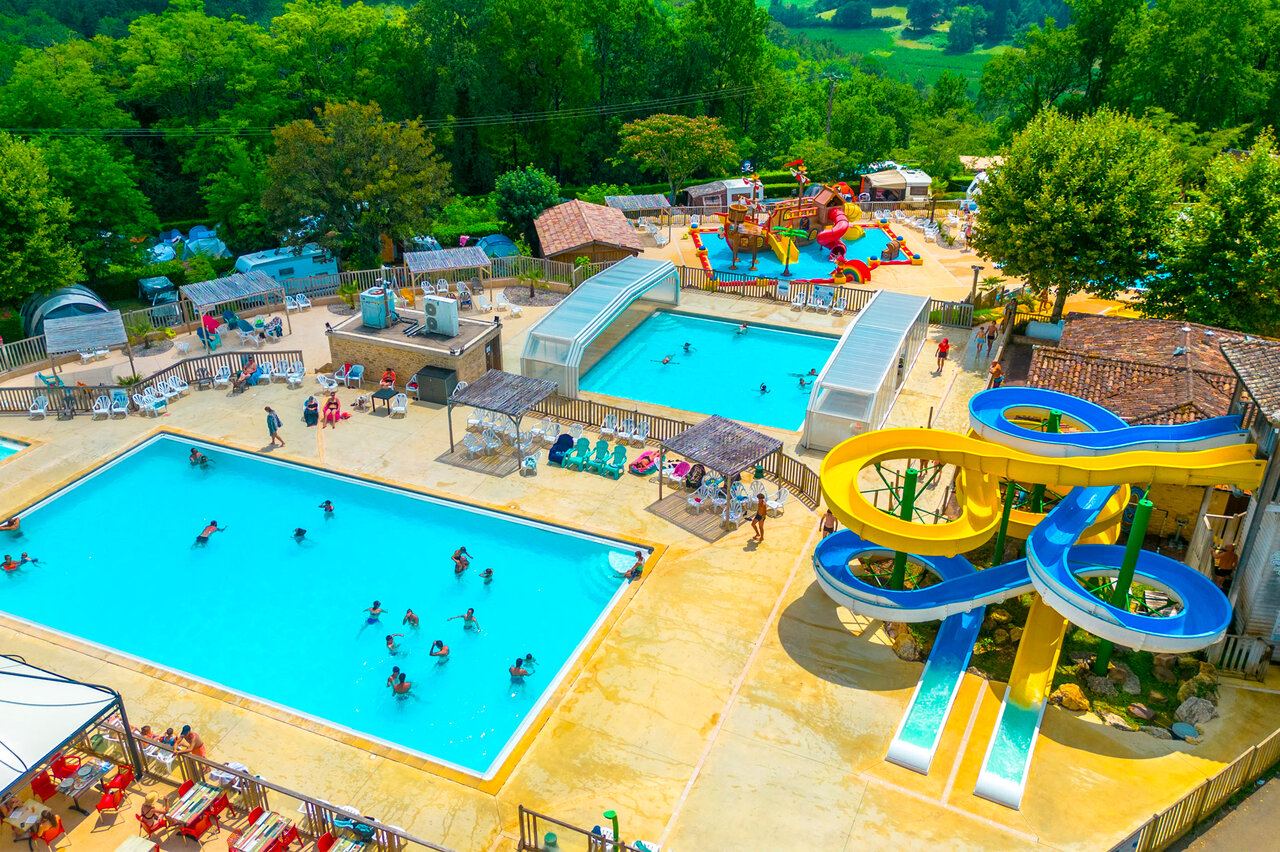 Piscinas, toboganes, juegos en el camping CAPFUN Hauts de Ratebout en STE FOY DE BELVES (24).