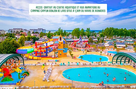 Piscinas, toboganes y zona de juegos acu�ticos en el camping Capfun Donjon de Lars.