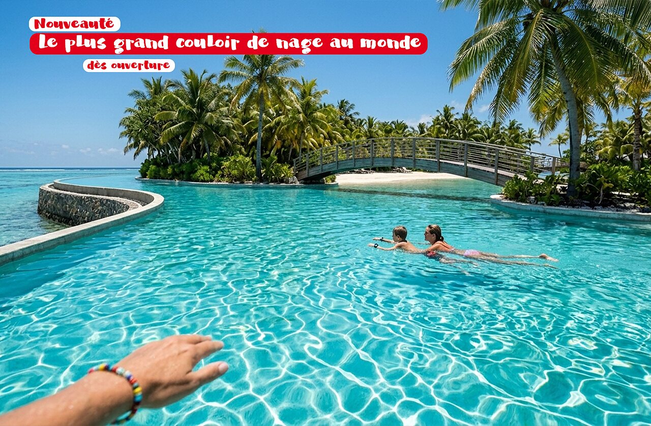 Largo carril de nataci�n y piscina tropical con palmeras en CAPFUN Joe Cook Island.