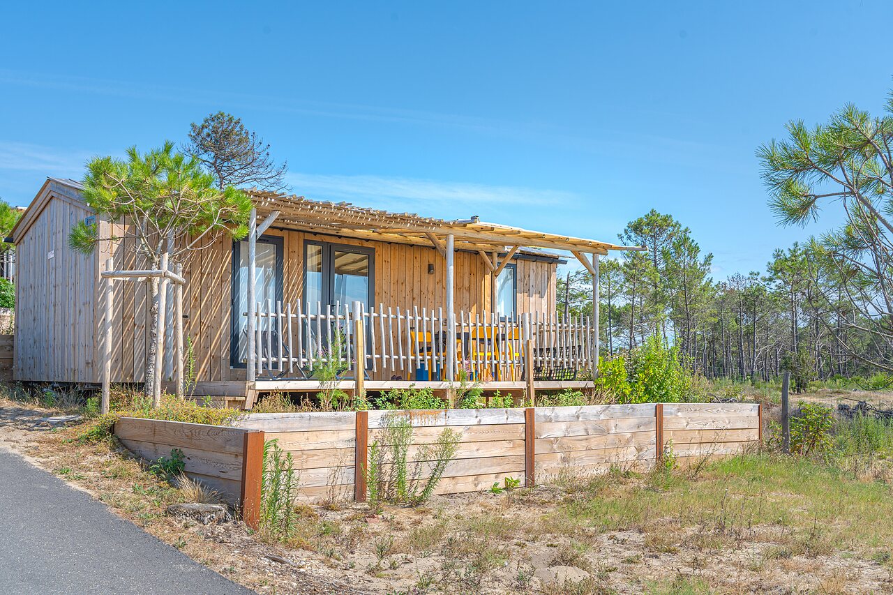 Mobil-home de madera con terraza, en el camping CLICOCHIC Petit Nice en PYLA SUR MER (33).