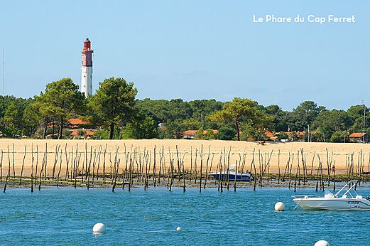 Faro de Cap Ferret, playa y barcos en la bah�a de Arcachon.
