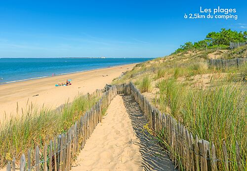 Playa de arena fina y camino de acceso en el camping CAPFUN Quatre Vents d'Ol�ron en St Georges d'Ol�ron (17).